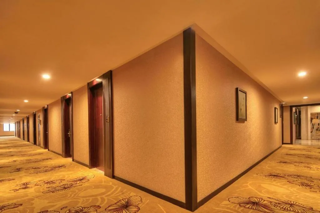 Bed in New Century Manju Hotel Shanghai New International Expo Center