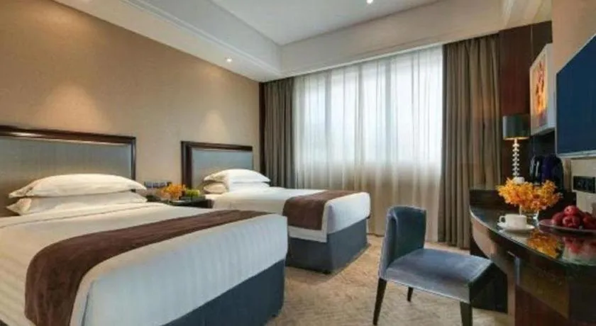 Bed in New Century Manju Hotel Shanghai New International Expo Center