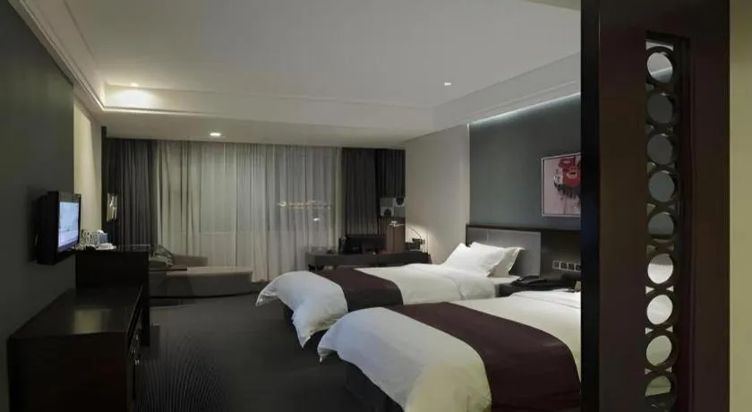 Bed in New Century Manju Hotel Shanghai New International Expo Center
