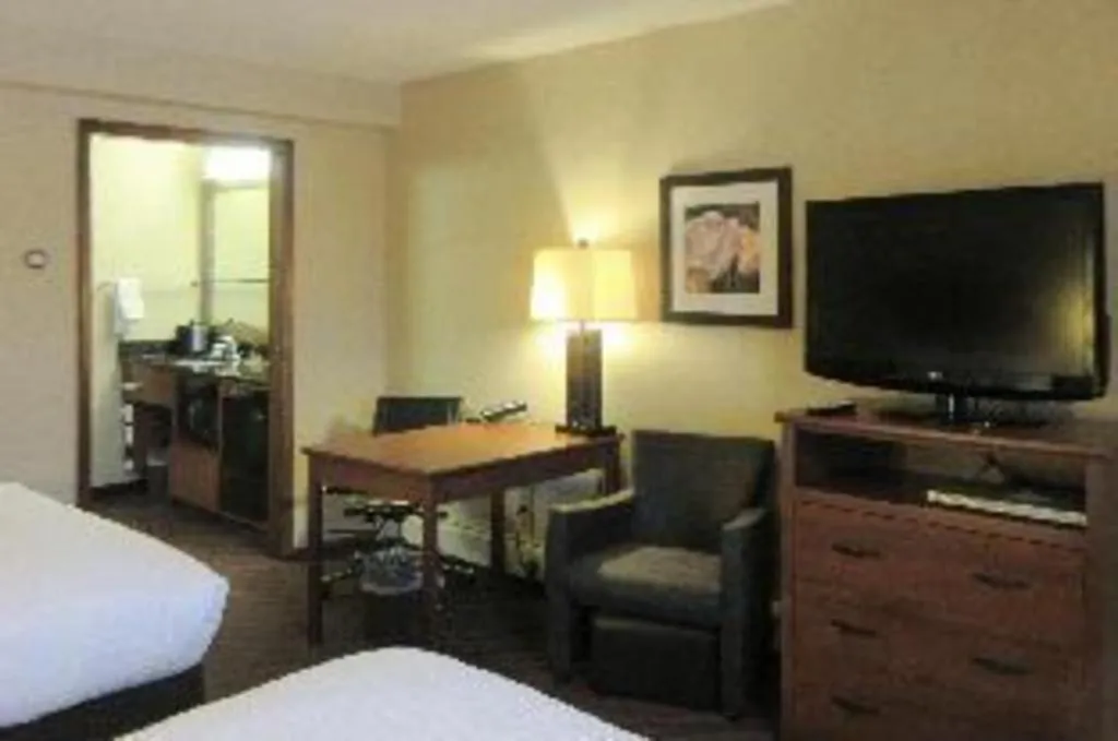 Bed in Quality Inn & Suites Detroit Lakes