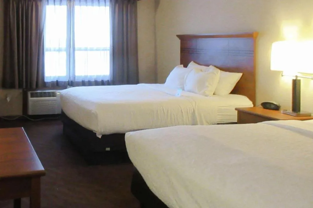 Bed in Quality Inn & Suites Detroit Lakes