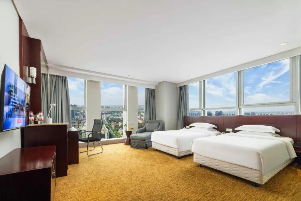 Bed in New Century Hotel Nanjing