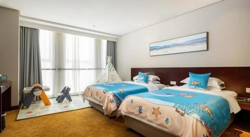 Bed in New Century Hotel Nanjing