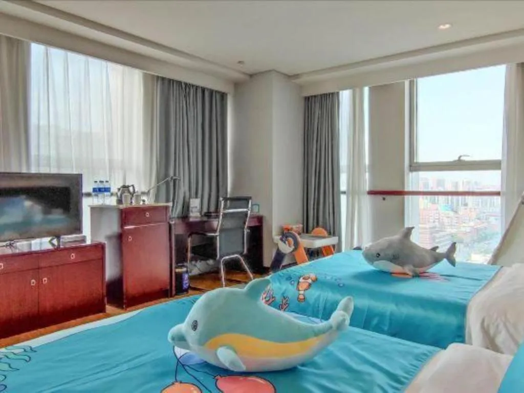 Bed in New Century Hotel Nanjing