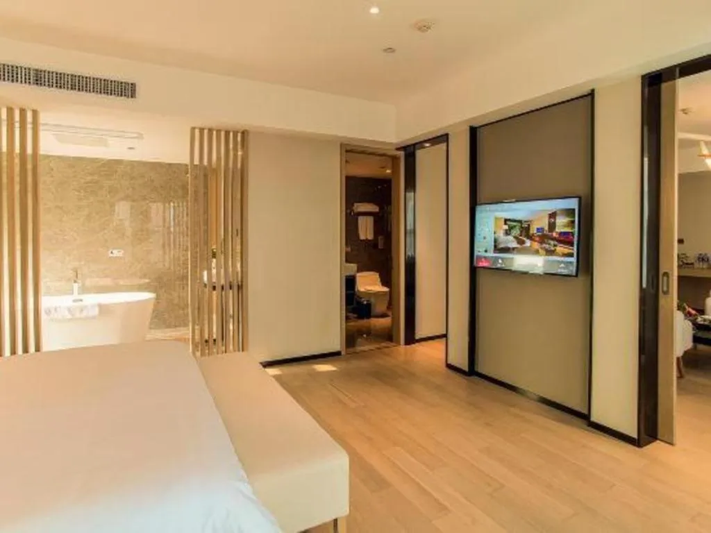 Bed in New Century Hotel Nanjing