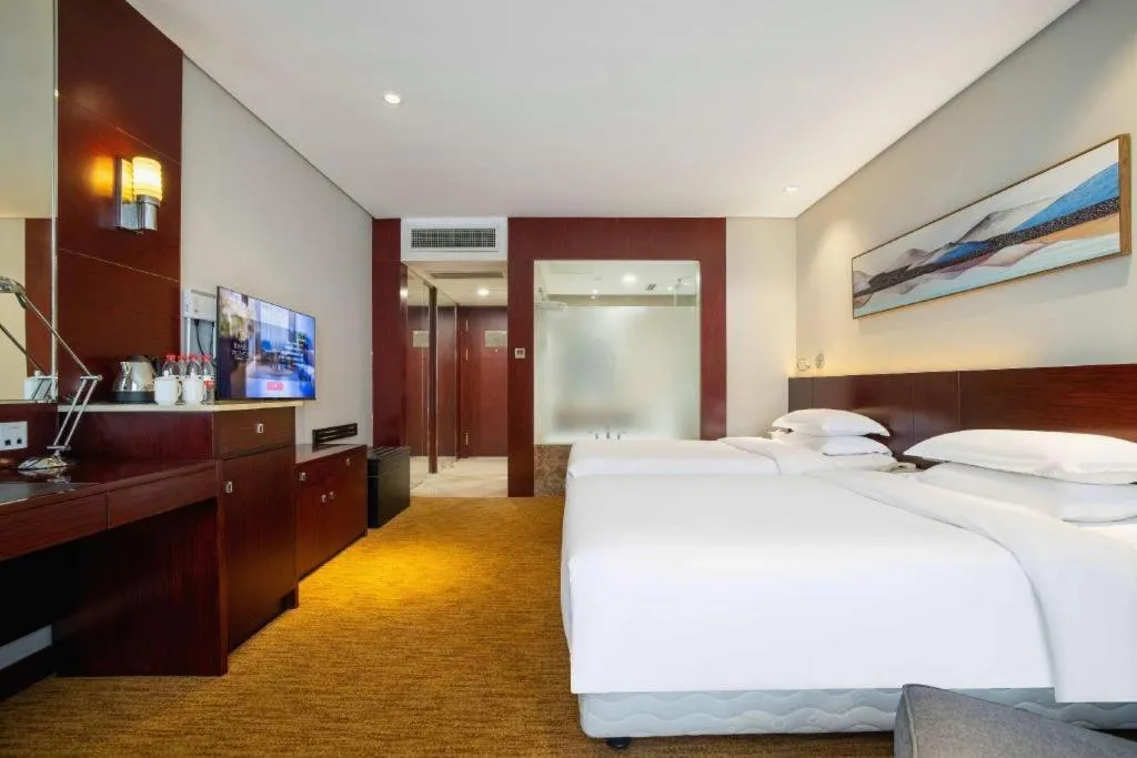 Bed in New Century Hotel Nanjing