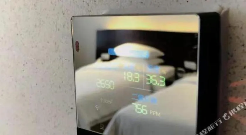 Bed in New Century Hotel Nanjing