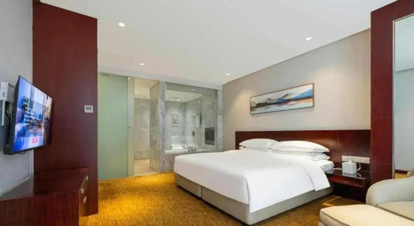 Bed in New Century Hotel Nanjing