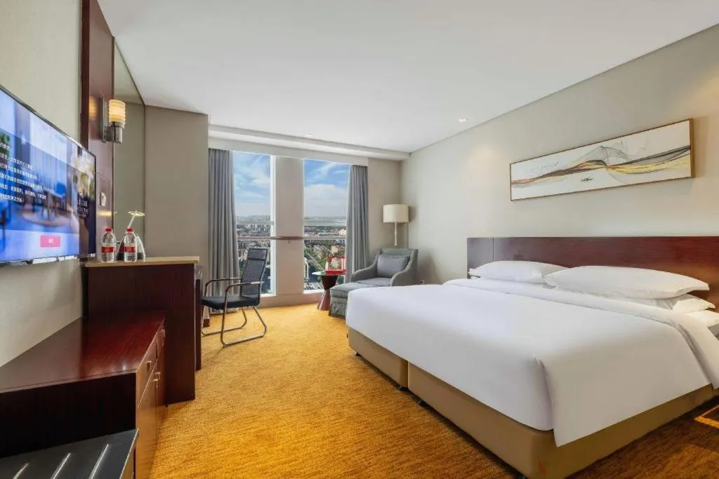 Bed in New Century Hotel Nanjing