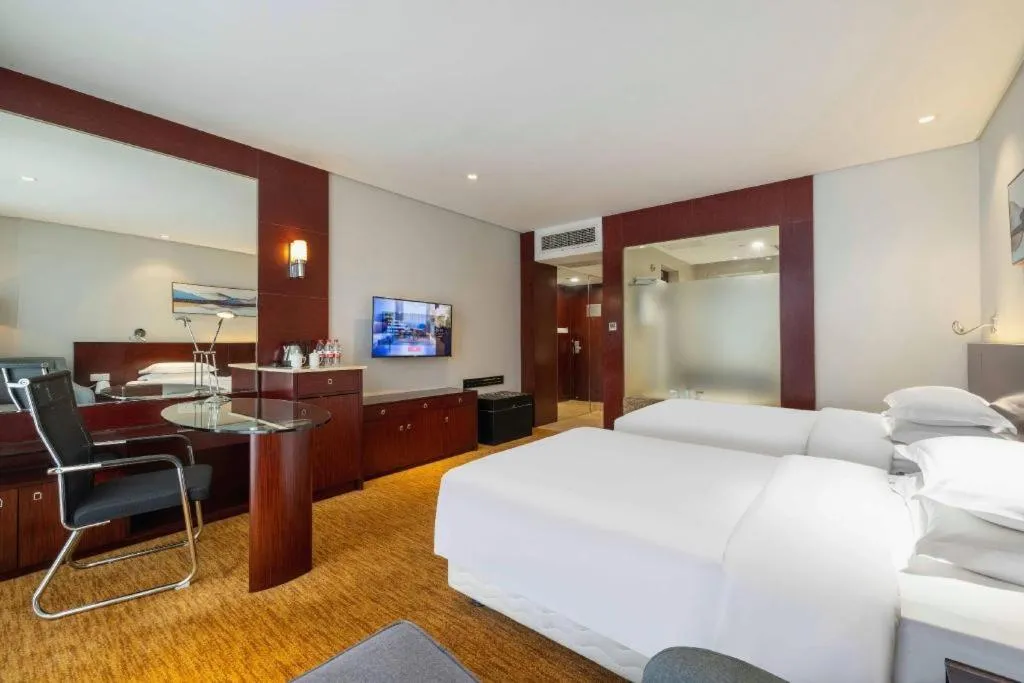 Bed in New Century Hotel Nanjing