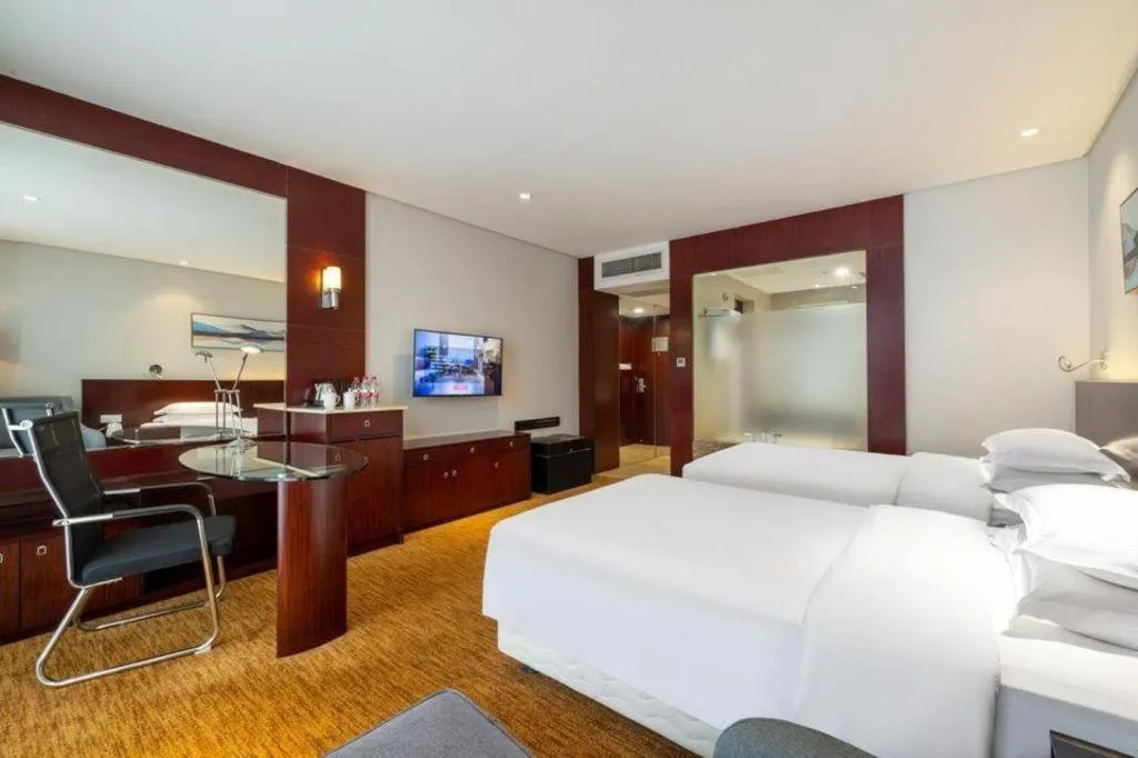 Bed in New Century Hotel Nanjing