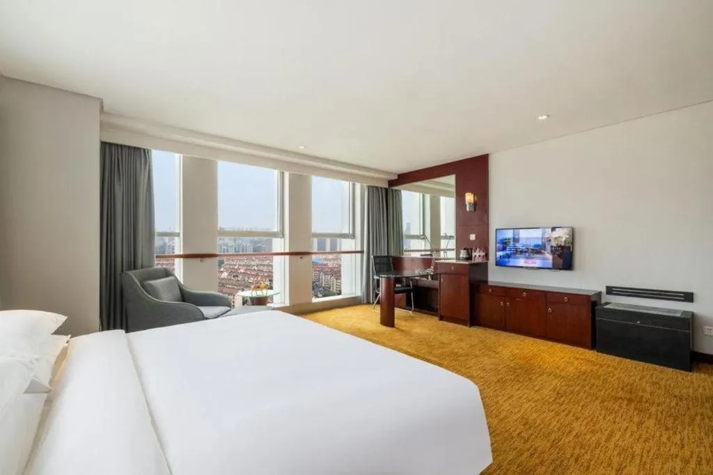 Bed in New Century Hotel Nanjing