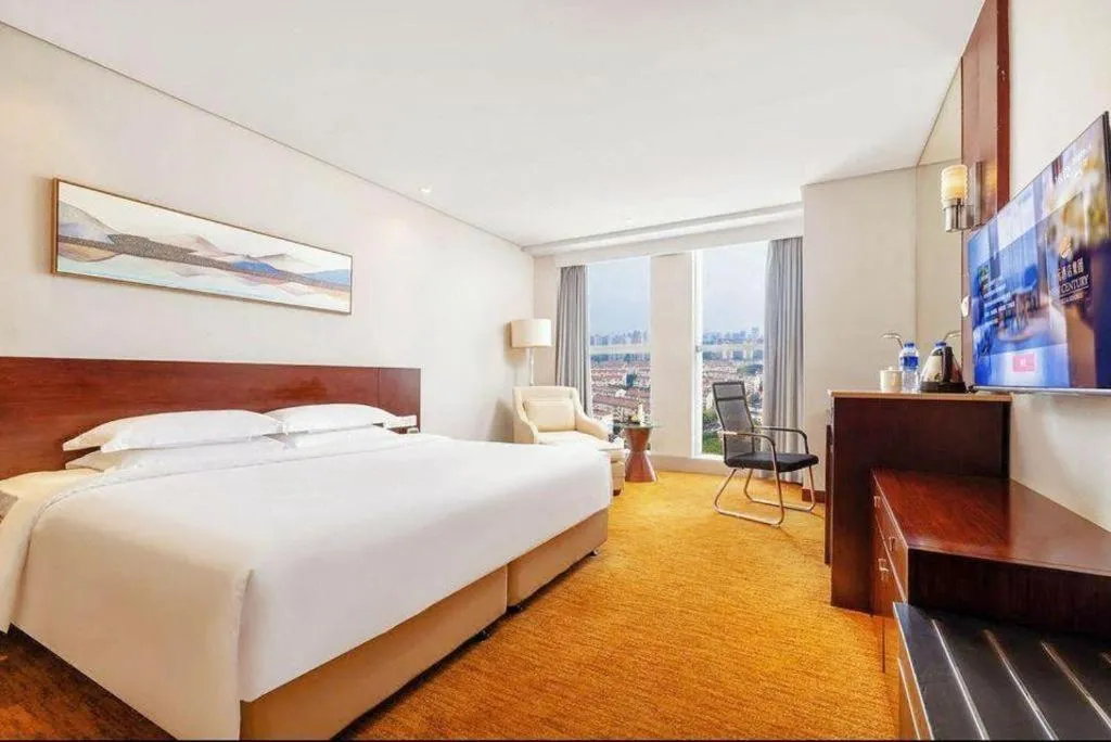 Bed in New Century Hotel Nanjing