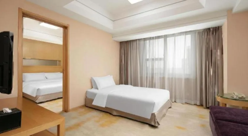 Bed in Ramada Plaza Shenyang Citycenter