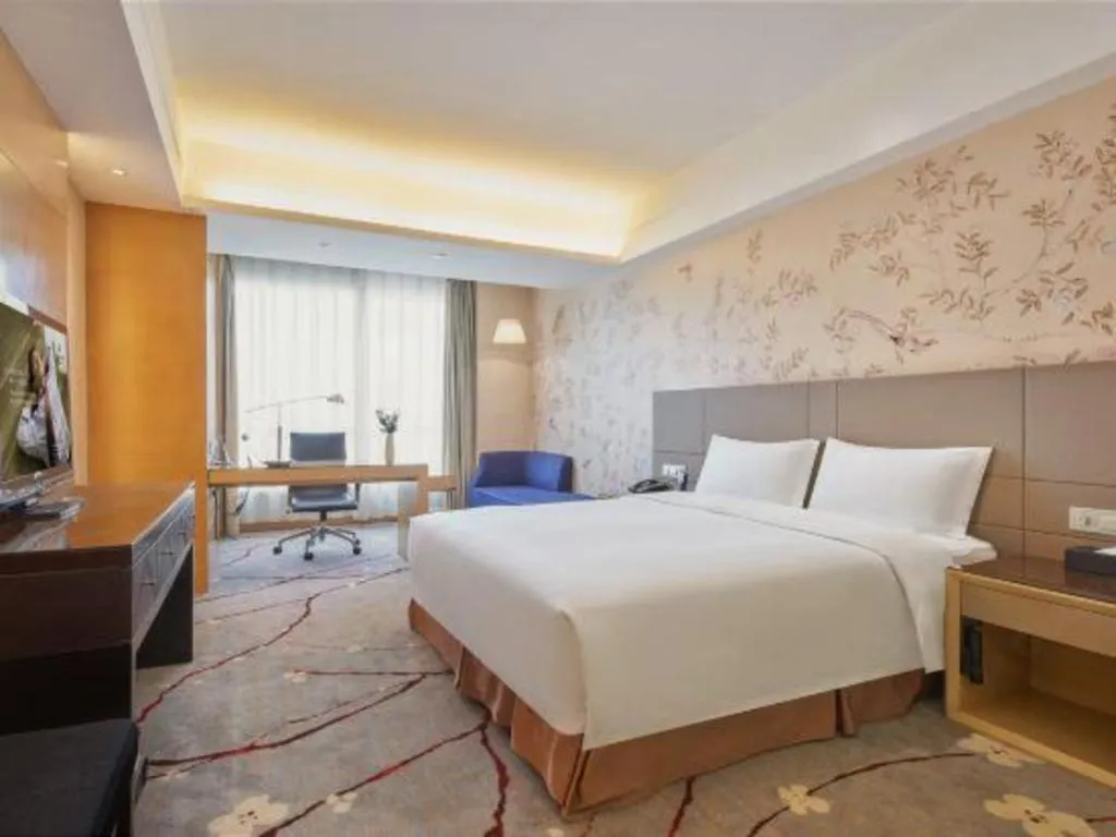 Bed in Yueyang Grand Skylight Hotel