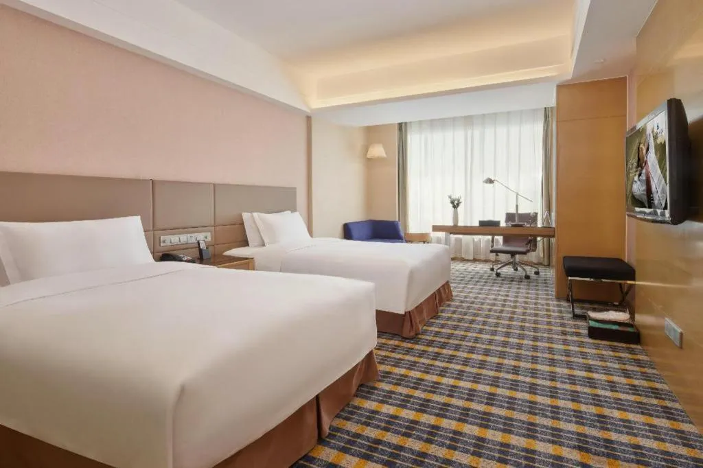 Bed in Yueyang Grand Skylight Hotel