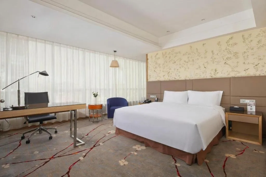 Bed in Yueyang Grand Skylight Hotel