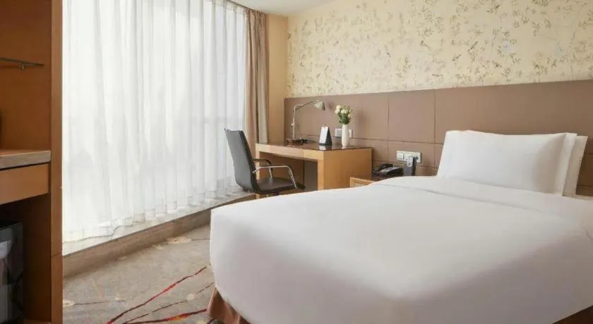 Bed in Yueyang Grand Skylight Hotel