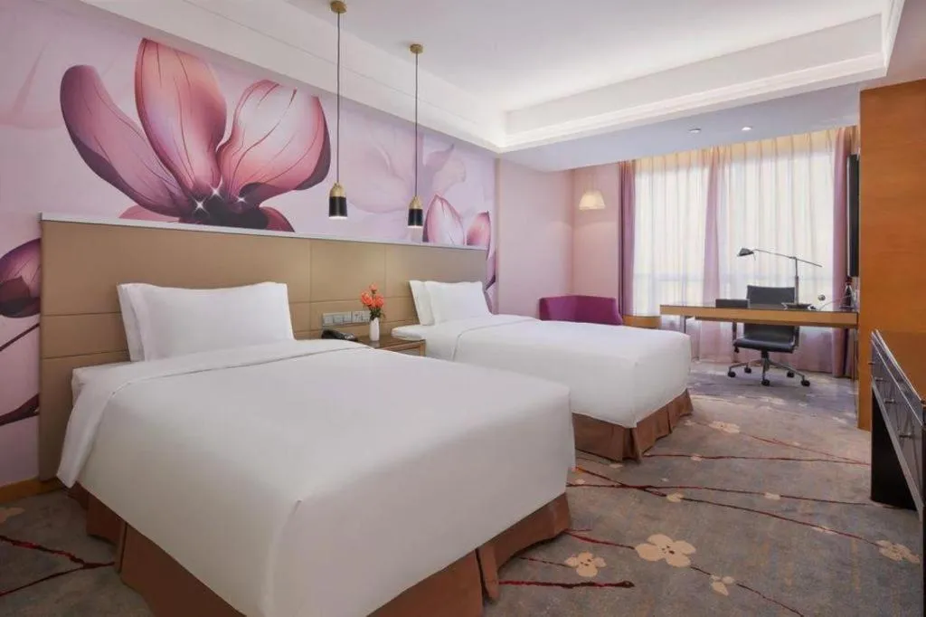 Bed in Yueyang Grand Skylight Hotel
