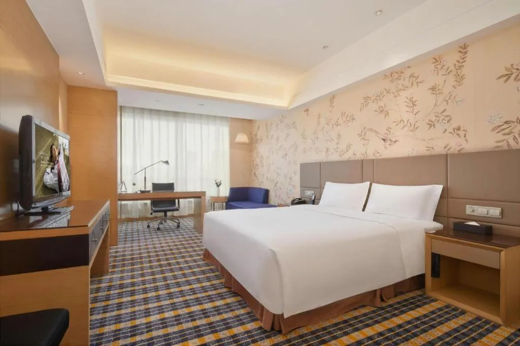 Bed in Yueyang Grand Skylight Hotel
