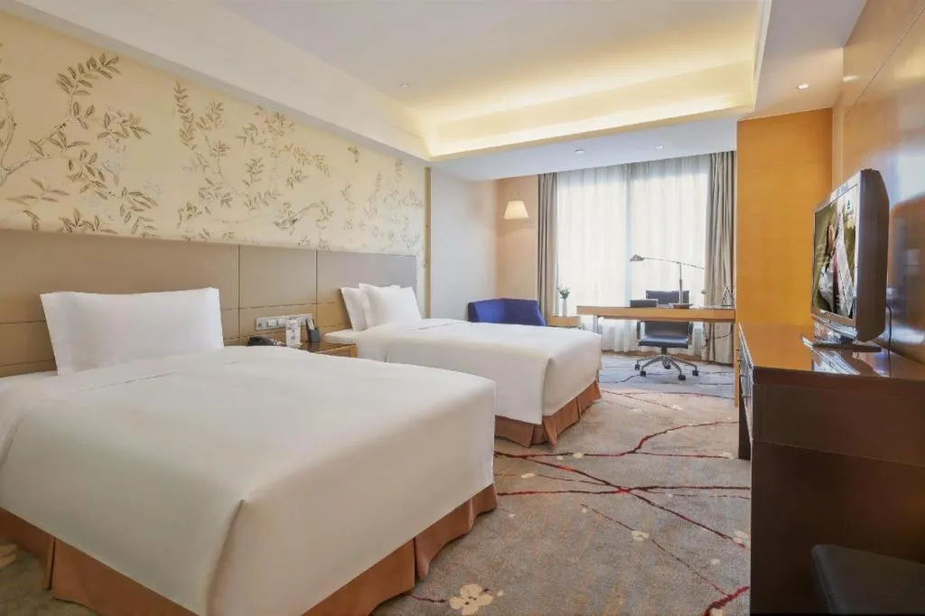 Bed in Yueyang Grand Skylight Hotel