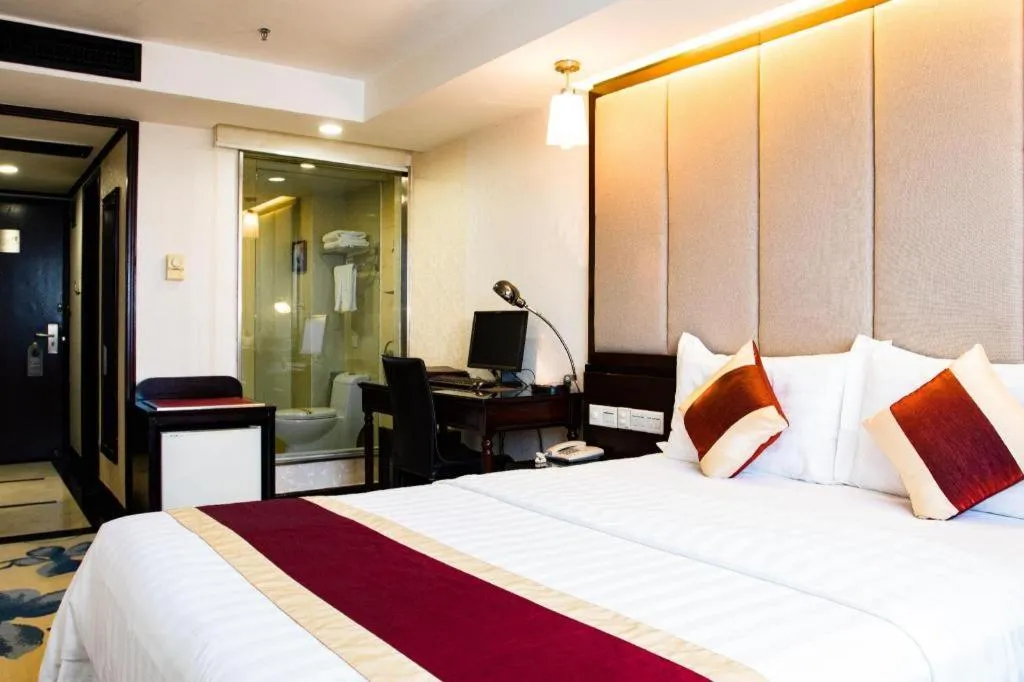 Bed in New World Hotel