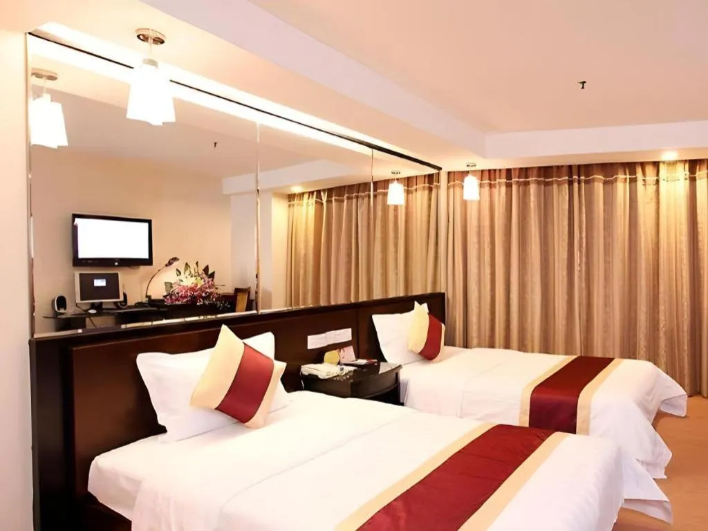 Bed in New World Hotel