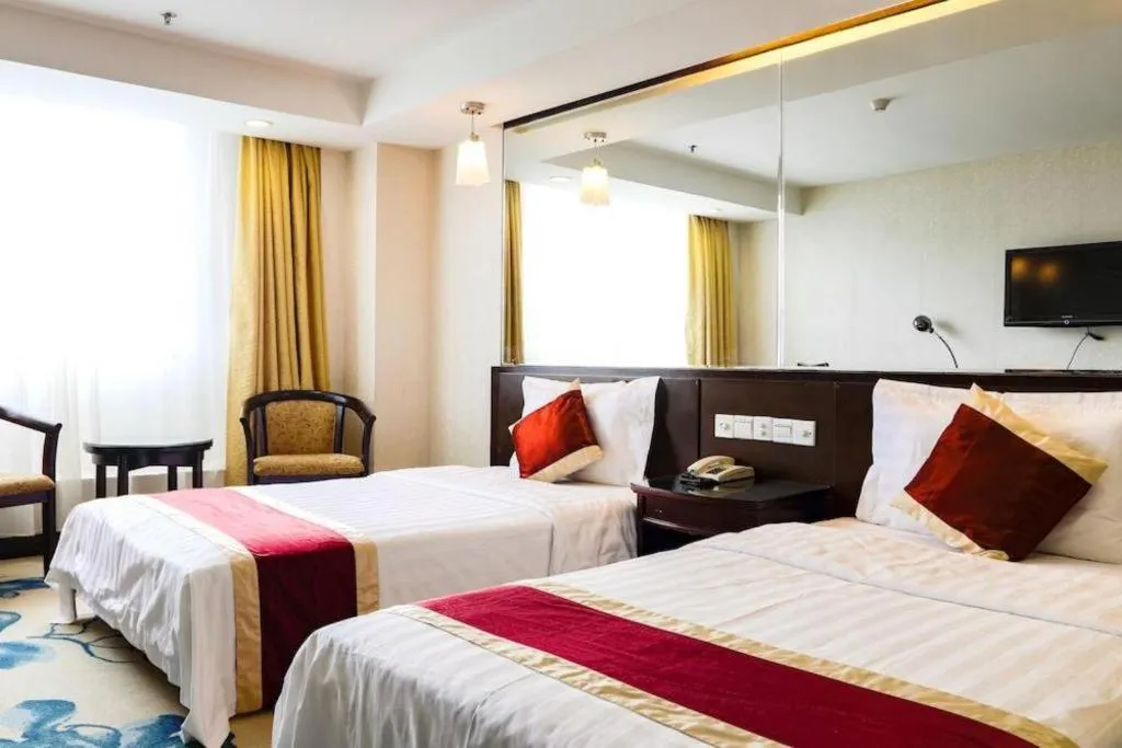 Bed in New World Hotel