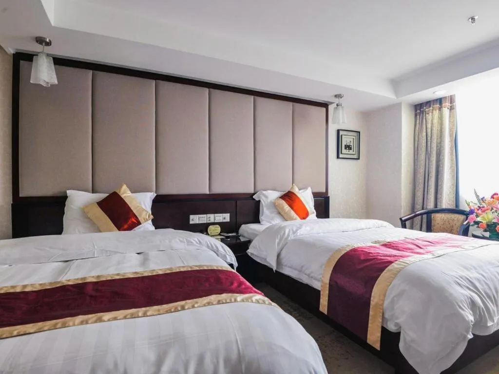 Bed in New World Hotel