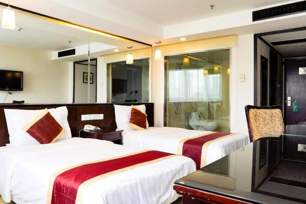 Bed in New World Hotel