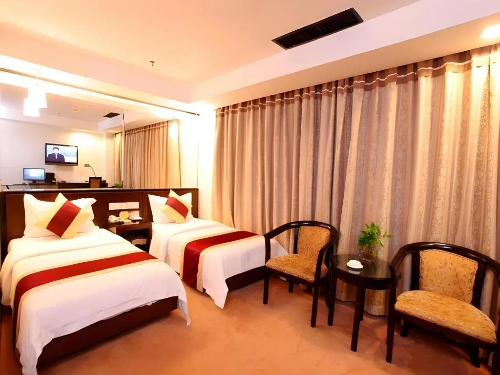 Bed in New World Hotel