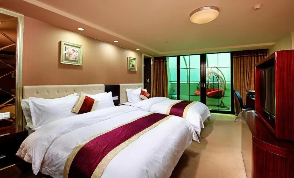 Bed in New World Hotel