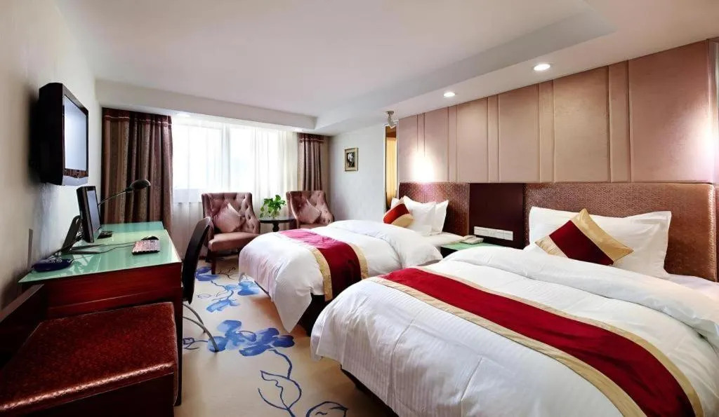 Bed in New World Hotel