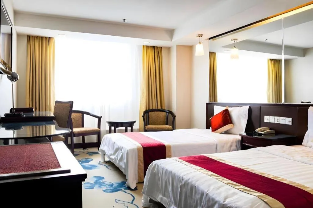 Bed in New World Hotel