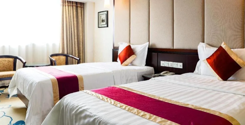 Bed in New World Hotel