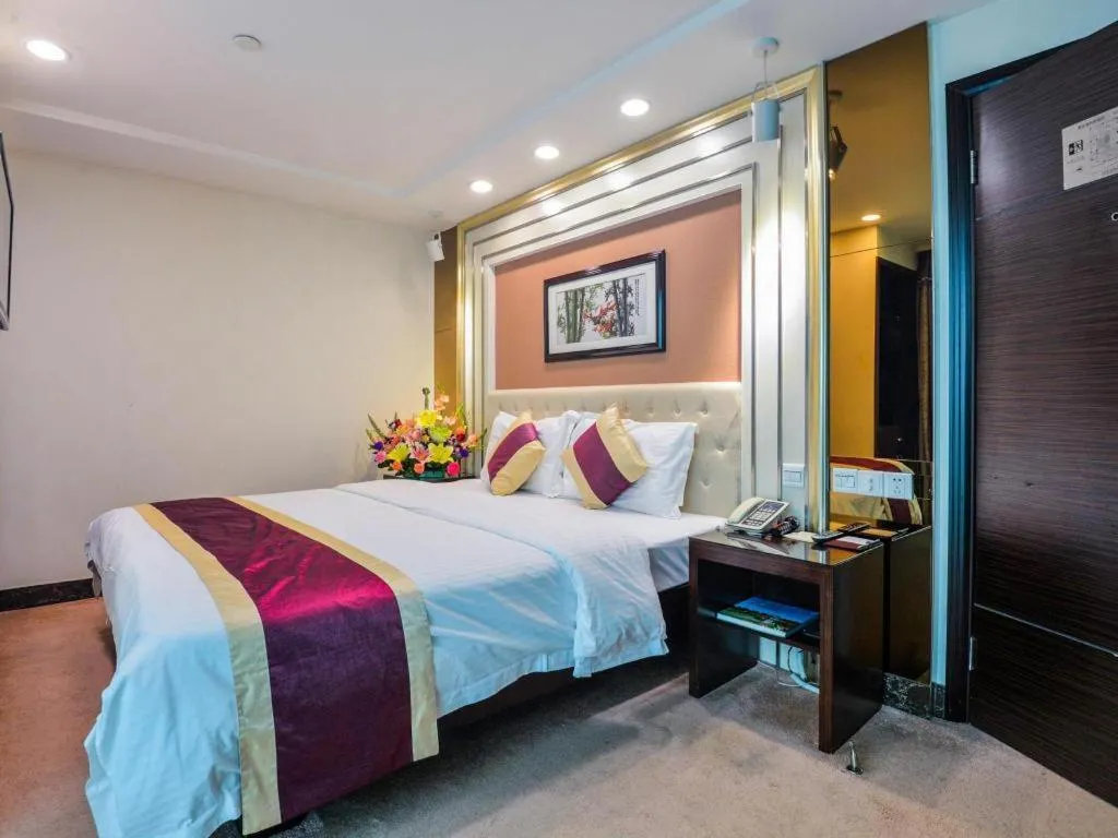 Bed in New World Hotel