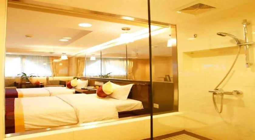 Bed in New World Hotel