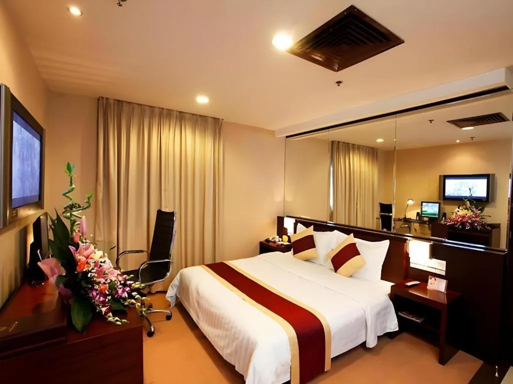 Bed in New World Hotel