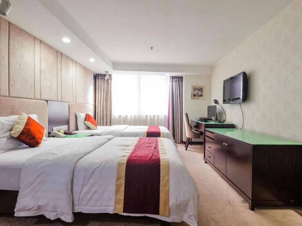 Bed in New World Hotel