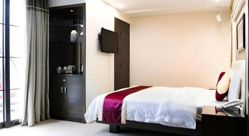 Bed in New World Hotel