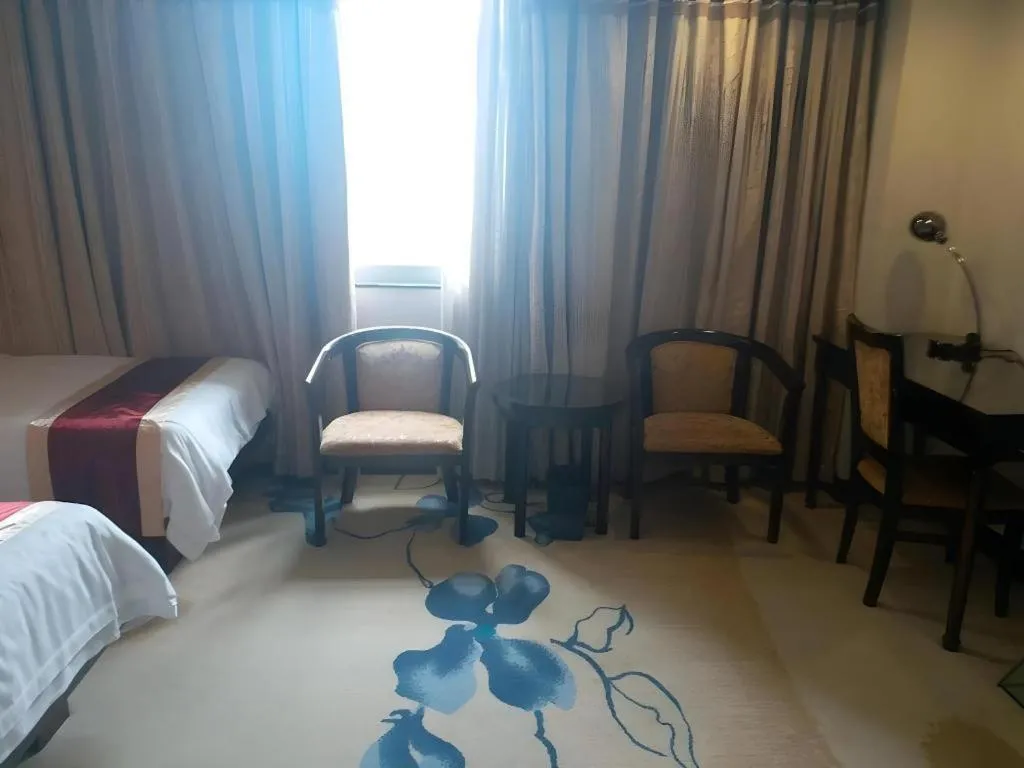 Bed in New World Hotel