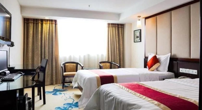 Bed in New World Hotel