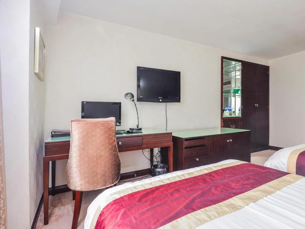 Bed in New World Hotel