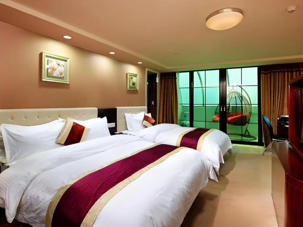 Bed in New World Hotel