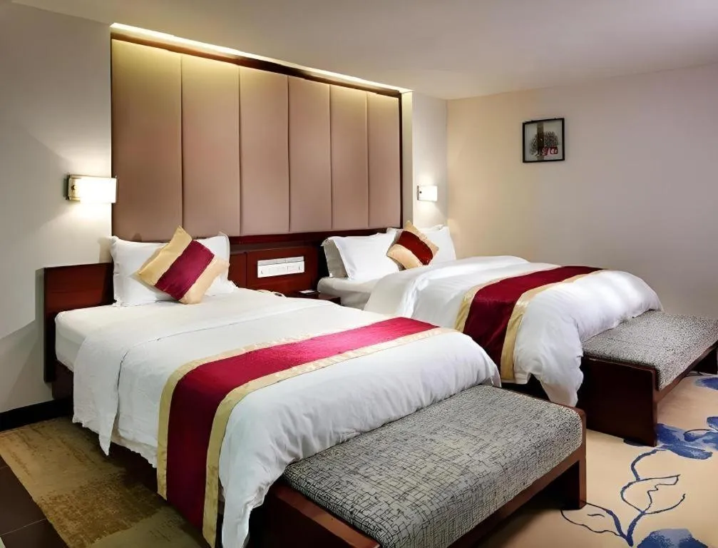 Bed in New World Hotel