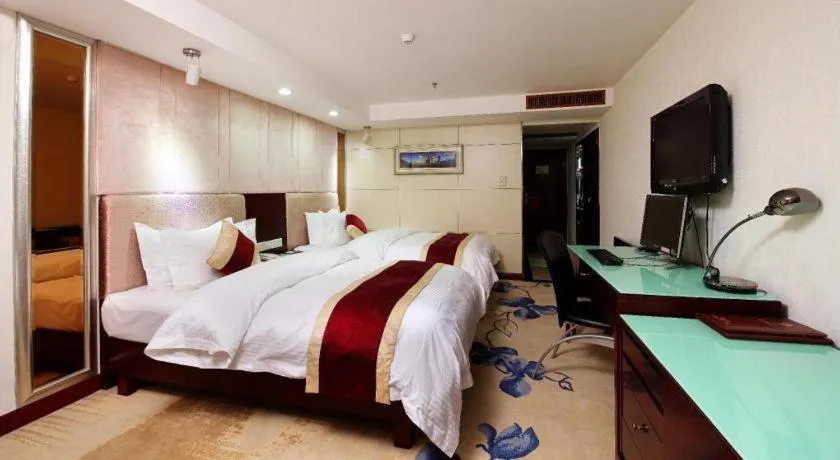 Bed in New World Hotel