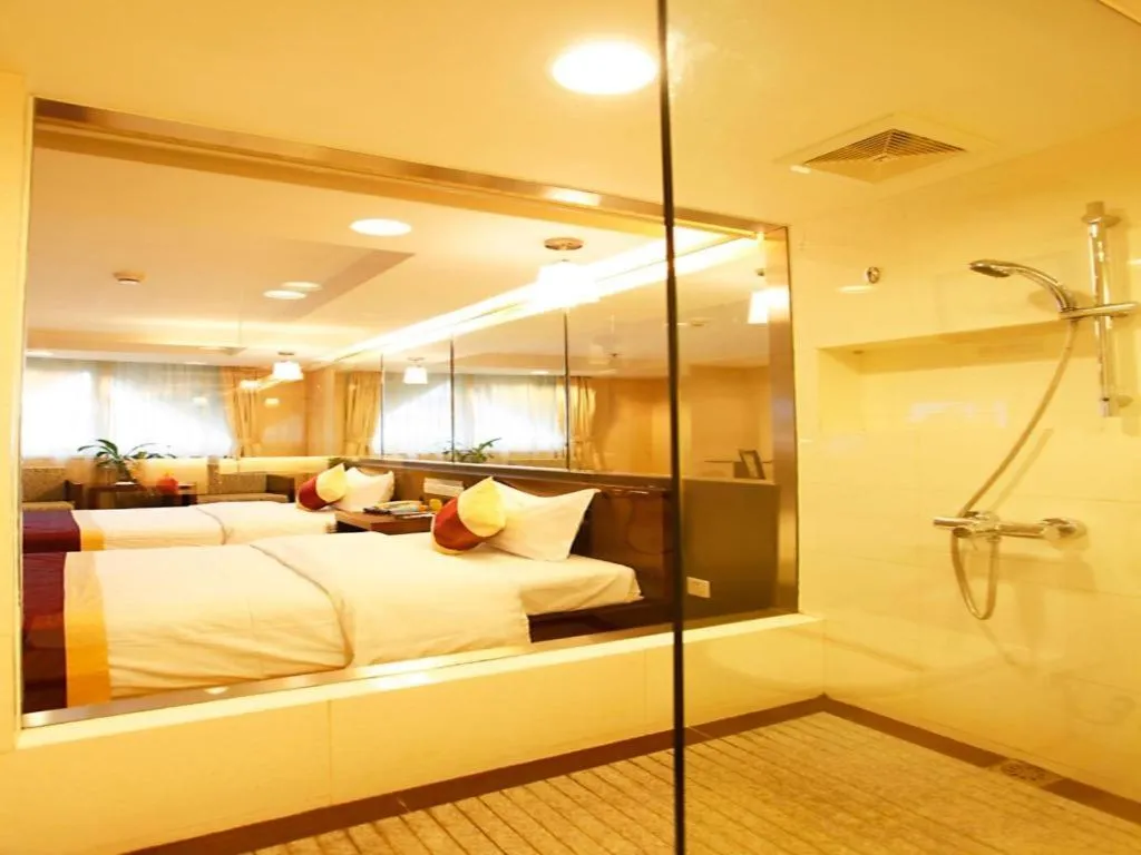 Bed in New World Hotel