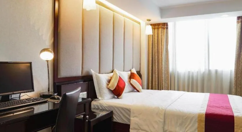 Bed in New World Hotel