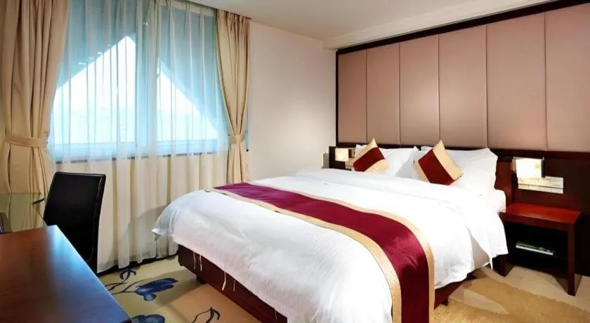 Bed in New World Hotel