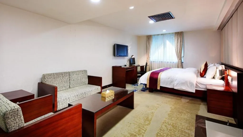 Bed in New World Hotel